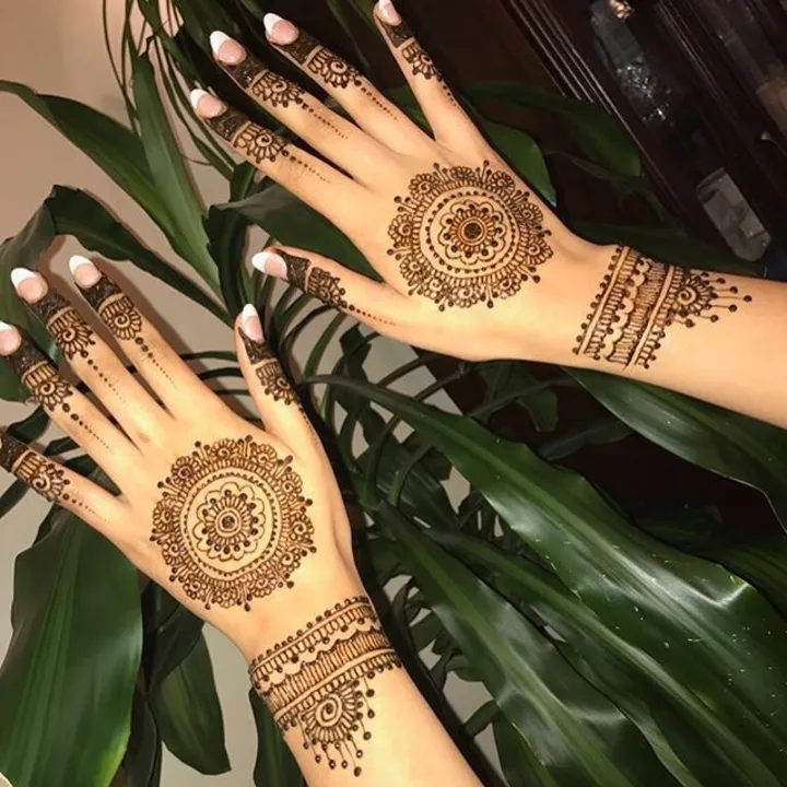 Mandala festival mehndi on the hand