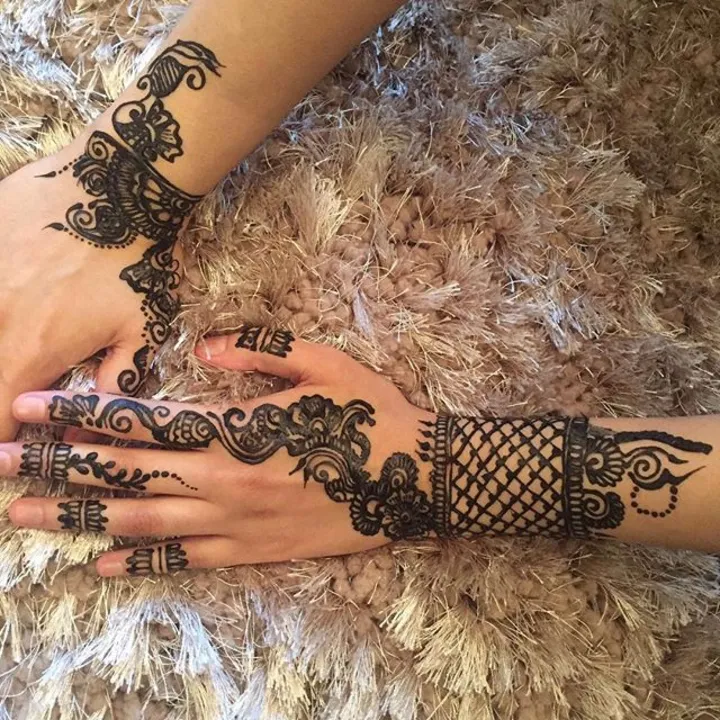Eid party henna on a guest's hands