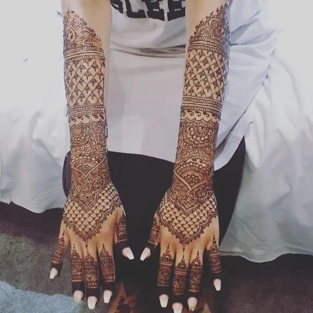 Custom bridal mehndi by Henna By IQ