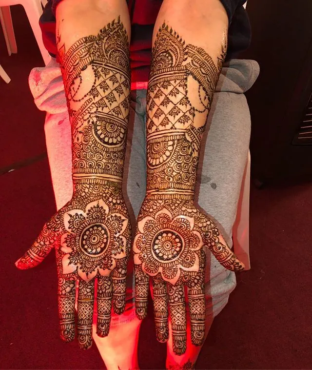 Intricate bridal henna on bride